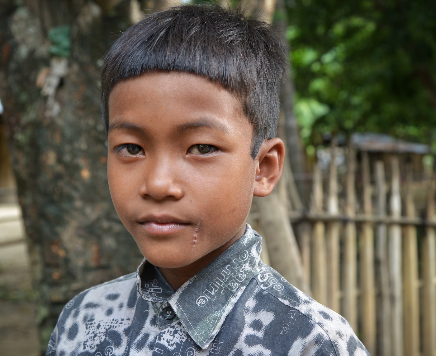 boy from cambodia by sandy hibbard at lensqueen.com photography