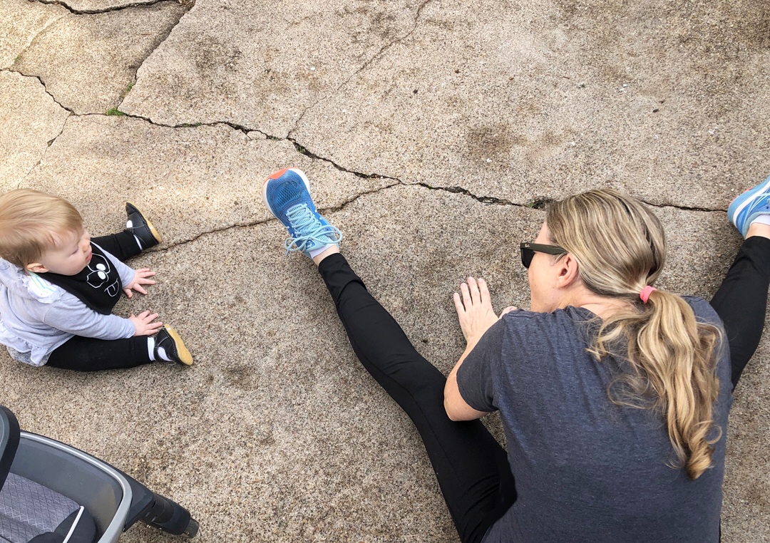 sandy and ellie stretching after a walk