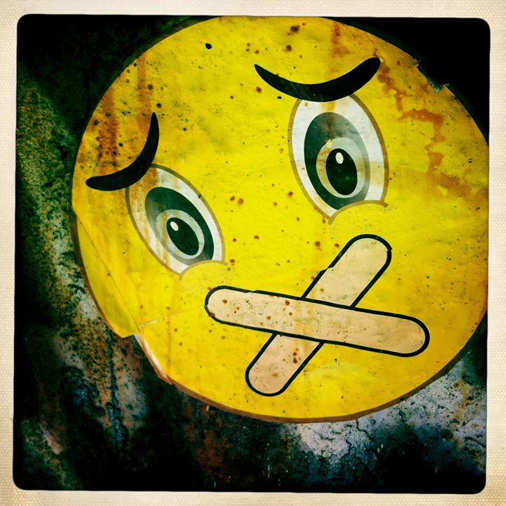 dont be silent happy face with tape over its mouth
