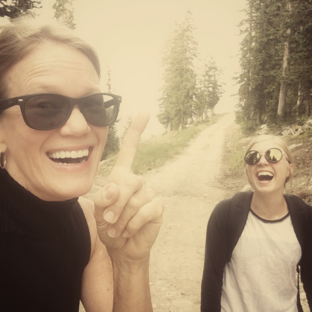 sandy on the trail with April in Utah laughing and being happy